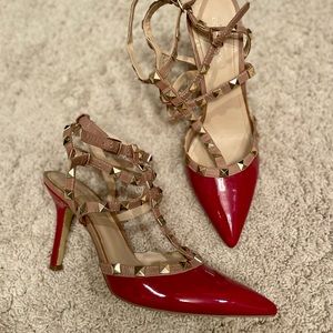 Red and tan leather heels with gold accents